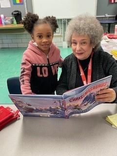 Sharon Buckwald Christmas book with Kamiah Holt.jpg